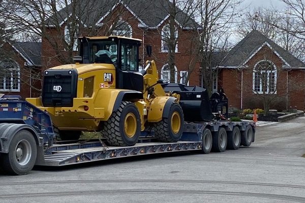 Santa said a new Wheel Loader wouldn't fit on his sleigh, so Mikey went and picked it up